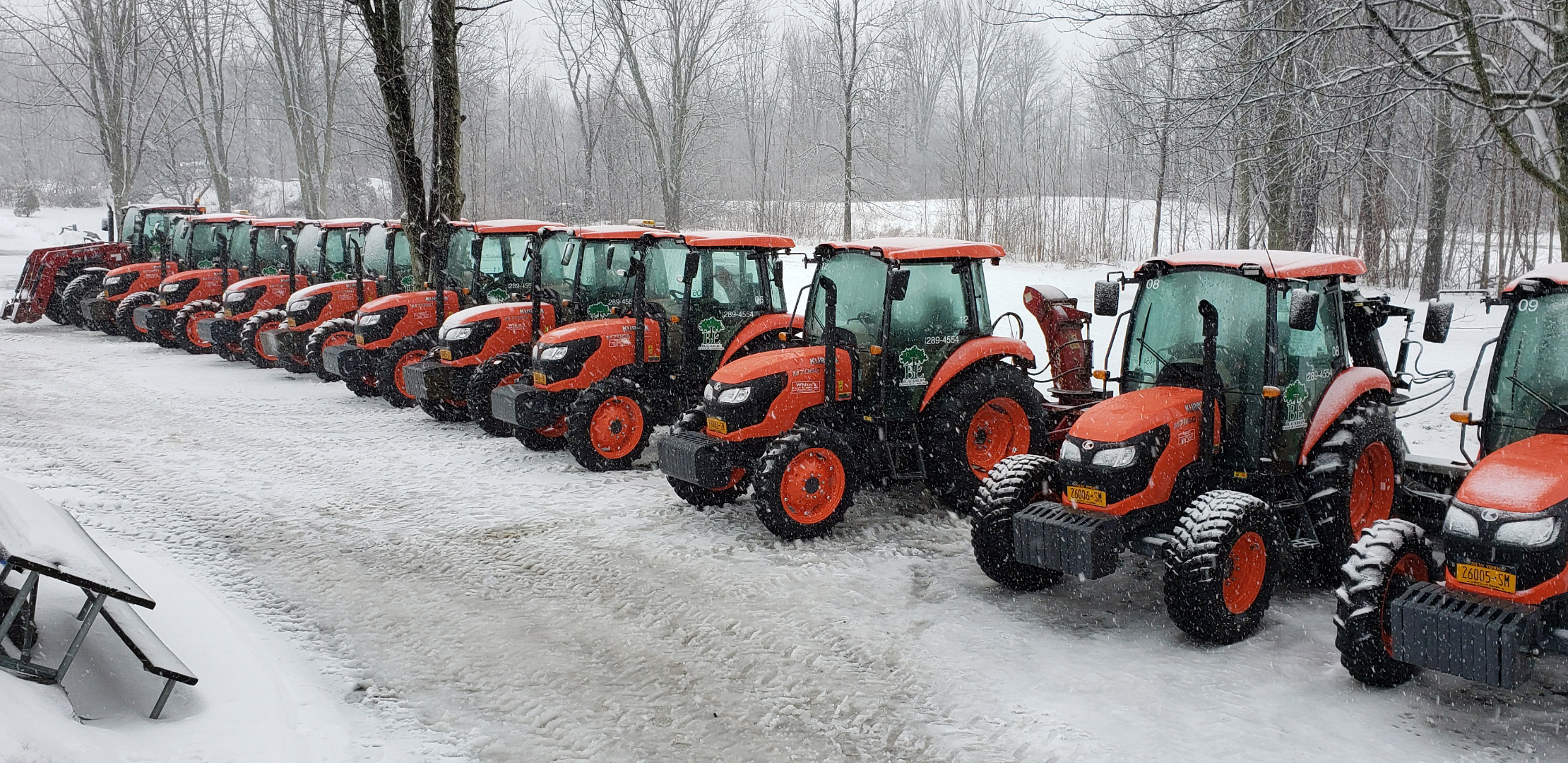 Photo of our 16+ fleet of tractors